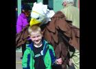 An eagle was on hand this weekend to greet visitors to the opening weekend of SOAR with the Eagles. Sometimes the guest got a hug…and sometimes a nibble on the head!—Photos by Michael Smith
