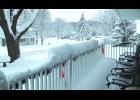 There would be no sitting in the rocking chairs on this front porch Friday morning. This editor knows, because that front porch is his and there was between 11 and 13 inches of new snowfall on it, just like everywhere else in the immediate area, when this photo was taken looking west along 10th Street Friday morning.
