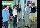 Lt. Governor Tina Smith (center, below) listens to National Egle Center Executive Director Rolf Thompson talk about the Eagle Center Thursday during her visit to Wabasha. Others pictured in the foreground are the Eagle Center’s Eileen Hanson, NEC board member Don Jacoby and Preston Cook, whose eagle art collection donation to the Eagle Center is a key component in their expansion plans.