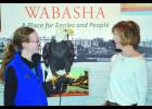 Lieutenant Governor Tina Smith and Angel seem to be communicating quite well in this nose-to-beak experience at the National Eagle Center last Thursday during the Lt. Governor’s visit here. The stop was part of the Governor and Lt. Governor’s “87 Counties in 86 Days” swing through the state to learn about local projects. Holding Angel is the Eagle Center’s Jennifer Drayna. —Photos by  Michael Smith