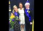 2014 W-K graduate Courtney Sill, Minnesota State University, Mankato Homecoming Queen (left), and Spencer Sulflow, Homecoming King, are pictured following the Coronation October 6. With them is Desiree Frederick, the 2015 MSM Homecoming Queen. (MSU, Mankato Photo)