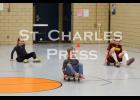 On Saturday afternoon, Eric Omdahl and Denise Boyum, of the Whitewater Kid’s Triathlon, hosted kids’ activities in the school gym. Above, friends compete in the scooter races. Photo by St. Charles Press Editor Laura Berndt. 