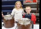 Lily and Dominic helped serve concessions with members of the St. Charles Parent Teacher Organization (PTO.) At the expo, the PTO also shared details about their upcoming carnival, which is scheduled for Friday, March 13th. Photo by St. Charles Press Editor Laura Berndt. 