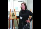 Shannon is pictured here with her Athletic Hall of Fame Plaque.